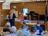 Bentz speaking to audience